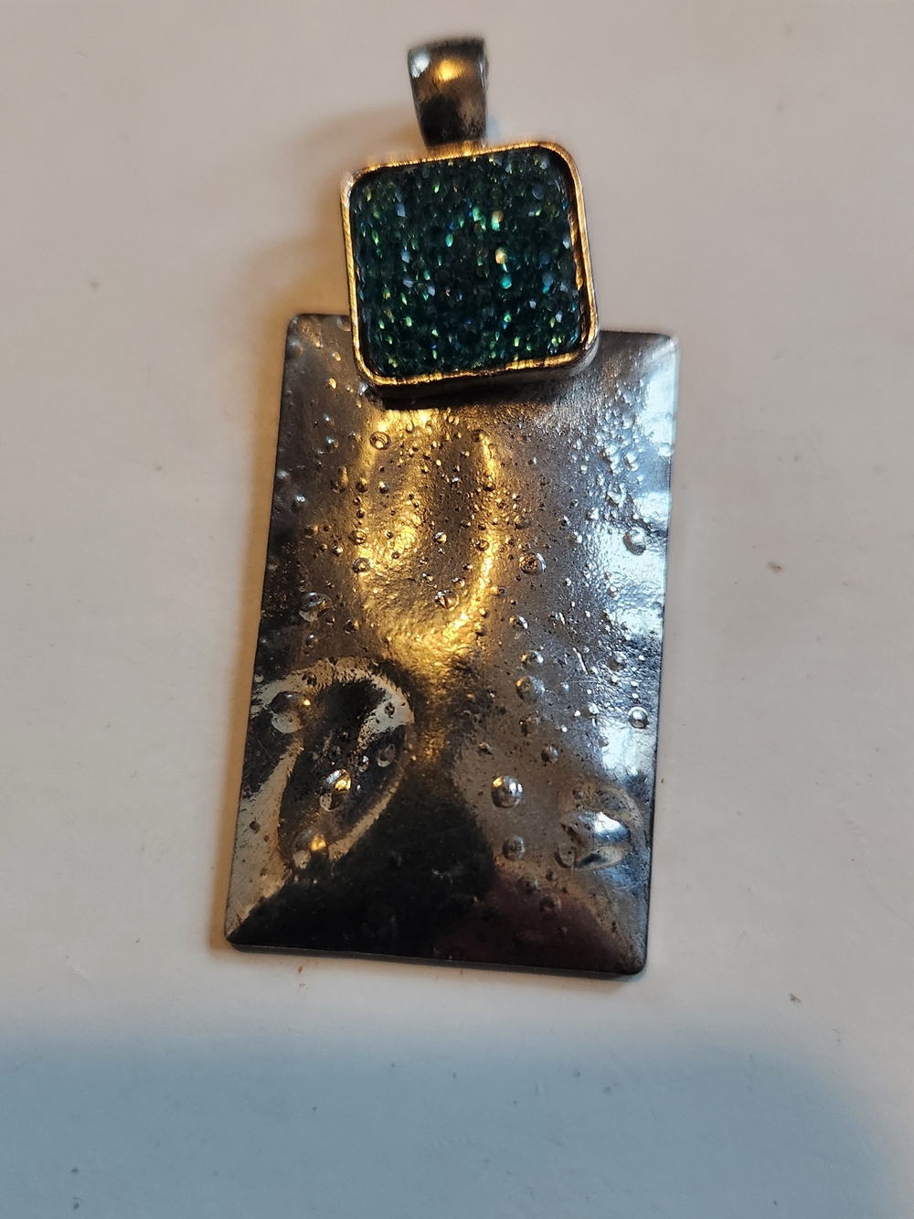 Rectangular Textured Silver Tone  Pendant with Sparkling Teal Accent. 2.5"